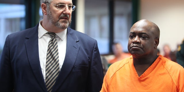 September 19: Assistant Public Defender Robert Trogolo, left, stands next to Jeremiah Fogle, 57, during Fogle's first appearance in front of County Judge Susan Barber Flood, in Bartow, Florida. Fogle has been charged with first-degree murder of his wife Theresa Fogle, 56, and three counts of attempted murder and shooting into an occupied dwelling.