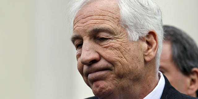 Feb. 10, 2012: Jerry Sandusky, a former Penn State assistant football coach charged with sexually abusing boys, pauses while speaking to the media at the Centre County Courthouse after a bail conditions hearing.