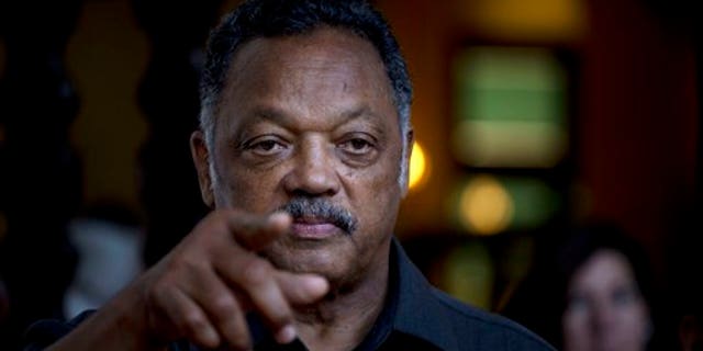 Rev. Jesse Jackson points to a reporter as he takes questions during an impromptu news conference at the Hotel Nacional in Havana, Cuba, Saturday, Sept. 28, 2013. Jackson accepted a request on Saturday by the Revolutionary Armed Forces of Colombia, or FARC, to oversee the release of a U.S. citizen Kevin Scott Sutay kidnapped in June. Jackson says he is in town for talks with religious leaders about their concerns for the poor, and peaceful relations between Cuba, the United States and the rest of the Caribbean. (AP Photo/Ramon Espinosa)