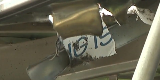 A hole in the roof of the tour boat after it was hit by a lava bomb last month.