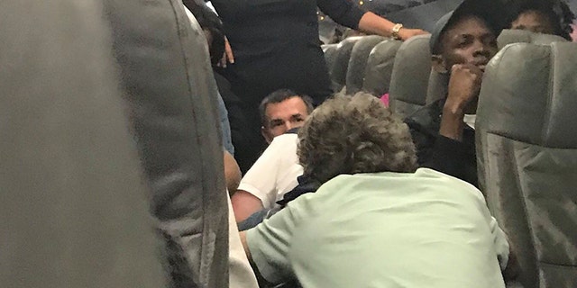 Upon the doctors’ instruction, the plane made an emergency landing in Fort Lauderdale while the two men helped keep the woman breathing.