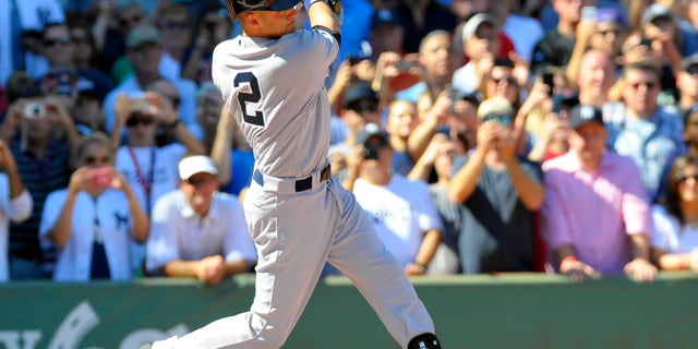 Sep 27, 2014; Boston, MA, USA; New York Yankees shortstop Derek Jeter (2) at bat during the first inning against the Boston Red Sox at Fenway Park. Mandatory Credit: Bob DeChiara-USA TODAY Sports - RTR47YY0