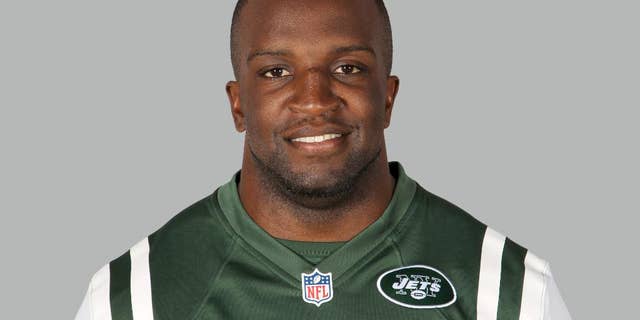 FILE - In this June 16, 2014, file photo, New York Jets' David Harris poses in an NFL football jersey in Florham Park, N.J. Harris is one of the most reluctant and least flashy star players this area has seen in recent years. (AP Photo/File)