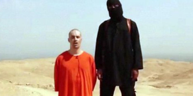 This still from a video released by ISIS shows slain American James Foley with a man believed to be Mohammed Emwazi, formerly known by the alias, "Jihadi John."