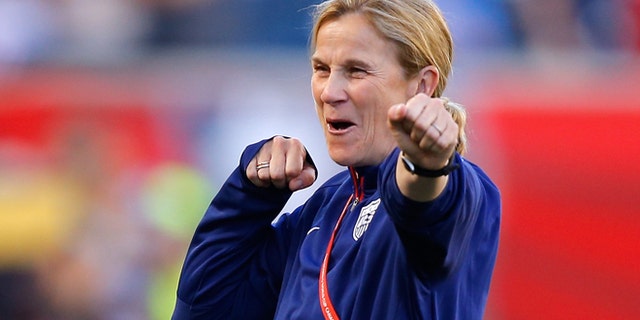 Head coach Jill Ellis of the United States watches her team warm up on June 12, 2015 in Winnipeg, Canada.