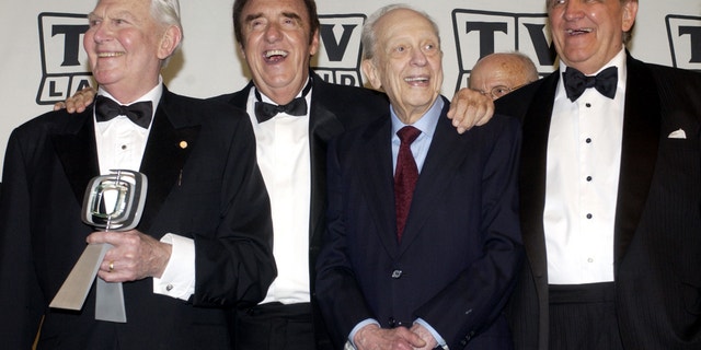 Andy Griffith, Jim Nabors, Don Knotts and George Lindsey, cast members in "The Andy Griffith Show," pose backstage after accepting the Legend Award for their series during a taping of the second annual TV Land Awards in Hollywood March 7, 2004.