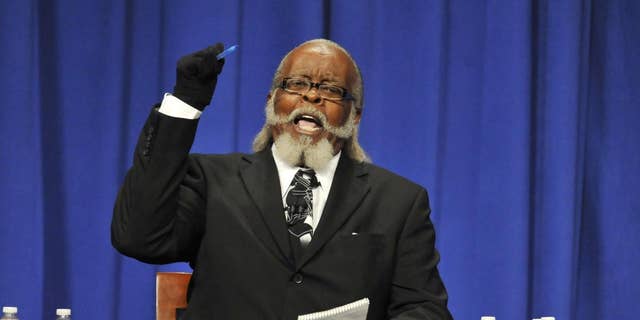 Jimmy McMillan, candidate for Rent is 2 Damn High party makes a point during the 2010 New York State Gubernatorial debate held at Hoftstra University in Hempstead, N.Y. (AP Photo/Kathy Kmonicek)