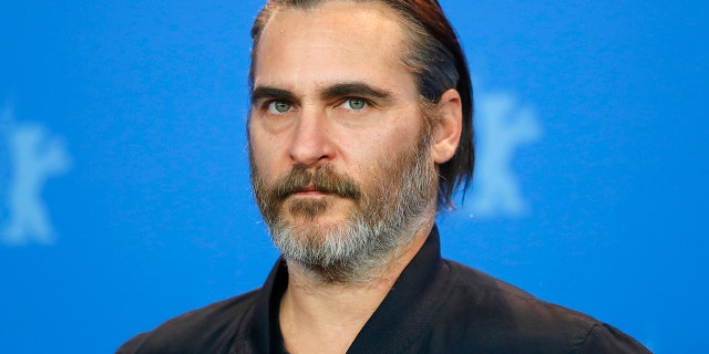 Actor Joaquin Phoenix poses during a photocall to promote the movie Don't Worry, He Won't Get Far on Foot at the 68th Berlinale International Film Festival in Berlin, Germany, February 20, 2018.