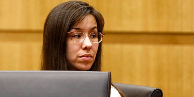 May 20, 2013: Jodi Arias looks at her family during the penalty phase of her murder trial at Maricopa County Superior Court in Phoenix, Ariz. (The Arizona Republic, Rob Schumacher, Pool)