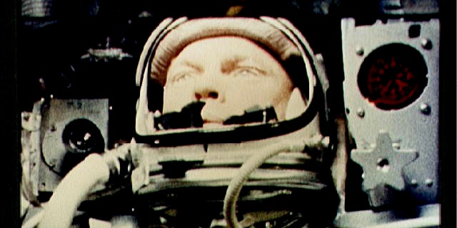 A camera aboard "Friendship 7" photographs John Glenn during a spaceflight on February 26, 1962.