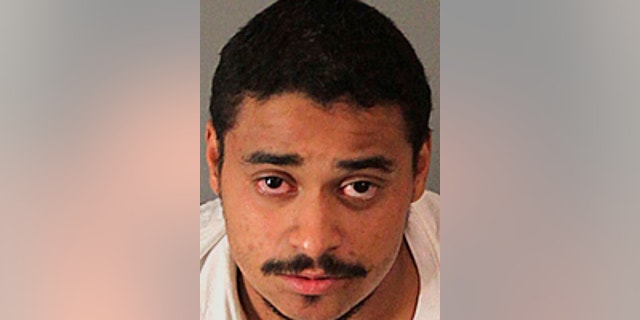 This Sunday, Oct. 9 2016 photo released by the Riverside County Sheriff's Department shows suspect John Felix, who was apprehended early Sunday after a lengthy standoff and faces charges including multiple counts of murder on a peace officer. Police said Felix suddenly pulled out a gun and opened fire on the officers who had responded to a family disturbance call Saturday. (Riverside County Sheriff's Department via AP)