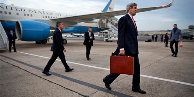 U.S. Secretary of State John Kerry arrives in Paris, on Saturday March 29, 2014. After leaving Saudi Arabia the secretary canceled a return to Washington in order to travel to Paris for a meeting with Russian Foreign Minister Sergey Lavrov about the situation in Ukraine. The meeting was arranged during a refueling stop in Ireland en route to Paris. (AP Photo/Jacquelyn Martin, Pool)