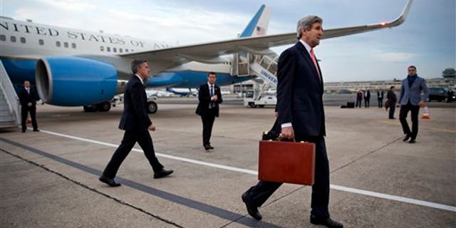 U.S. Secretary of State John Kerry arrives in Paris, on Saturday March 29, 2014. After leaving Saudi Arabia the secretary canceled a return to Washington in order to travel to Paris for a meeting with Russian Foreign Minister Sergey Lavrov about the situation in Ukraine. The meeting was arranged during a refueling stop in Ireland en route to Paris. (AP Photo/Jacquelyn Martin, Pool)
