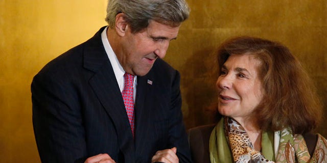 This November 12, 2013 photos shows U.S. Secretary of State John Kerry and his wife Teresa Heinz Kerry in Washington.
