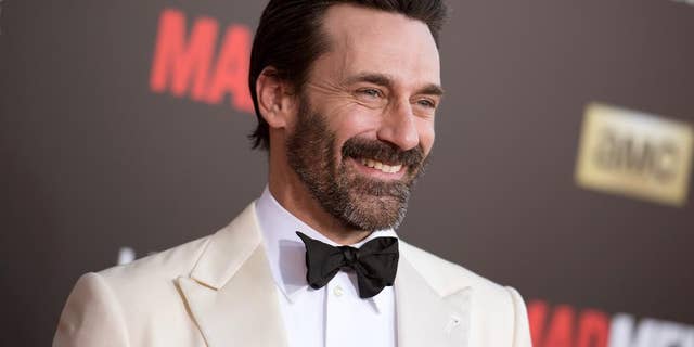 FILE - In this March 25, 2015 file photo, Jon Hamm arrives at The Black And Red Ball In Celebration Of The Final Seven Episodes Of "Mad Men" in Los Angeles. Court records show “Mad Men” star Jon Hamm was accused of helping lead a violent 1990 fraternity hazing at the University of Texas. (AP Photo/Photo by Richard Shotwell/Invision/AP, File)