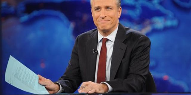 FILE - This Nov. 30, 2011, file photo shows television host Jon Stewart during a taping of "The Daily Show with Jon Stewart" in New York. (AP Photo/Brad Barket, File)