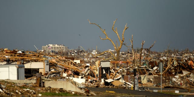 May 30: Damage is seen in a devastated Joplin, Missouri neighborhood. A federal agency was set to release a report today detailing communication efforts ahead of the massive twister that hit Joplin, killing more than 160 people.