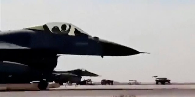 Feb. 4, 2015 - A Jordanian air force pilot taxis his jet at Mowafak Al-Salti airbase in Azraq, Jordan. The military has carried out airstrikes on ISIS weapons depots and training sites in retaliation for the killing of one of Jordan's pilots.