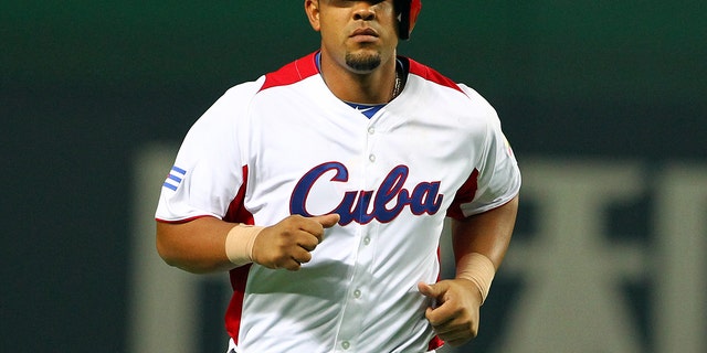 FUKUOKA, JAPAN - MARCH 04: Infielder Jose Abreu #79 of Cuba celebrates after scoring a hit grand slam homer in the bottom half of the fifth inning during the World Baseball Classic First Round Group A game between Cuba and China at Fukuoka Yahoo! Japan Dome on March 4, 2013 in Fukuoka, Japan. (Photo by Koji Watanabe/Getty Images)