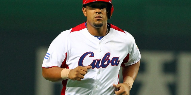 FUKUOKA, JAPAN - MARCH 04: Infielder Jose Abreu #79 of Cuba celebrates after scoring a hit grand slam homer in the bottom half of the fifth inning during the World Baseball Classic First Round Group A game between Cuba and China at Fukuoka Yahoo! Japan Dome on March 4, 2013 in Fukuoka, Japan. (Photo by Koji Watanabe/Getty Images)