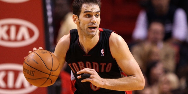 MIAMI, FL - JANUARY 22: Jose Calderon #8 of the Toronto Raptors dribbles the ball during a game against the Miami Heat at American Airlines Arena on January 22, 2011 in Miami, Florida. NOTE TO USER: User expressly acknowledges and agrees that, by downloading and/or using this Photograph, User is consenting to the terms and conditions of the Getty Images License Agreement. (Photo by Mike Ehrmann/Getty Images) *** Local Caption *** Jose Calderon