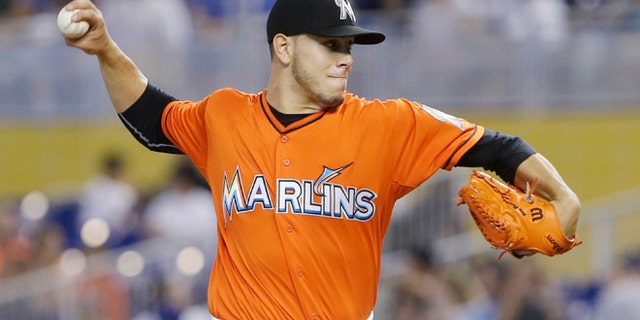 Jose Fernandez delivers a pitch against the Los Angeles Dodgers, Sunday, May 4, 2014, in Miami.