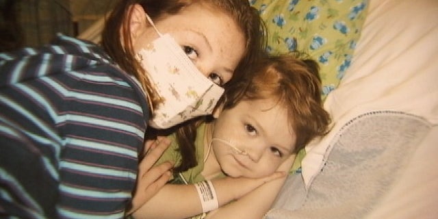 Julia Jenkins with one of her younger brothers (My Fox Atlanta).