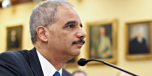 Attorney General Eric Holder testifies on Capitol Hill in Washington, Tuesday, Feb. 28, 2012, before a House Appropriations subcommittee hearing on the Justice Department's fiscal 2013 budget. (AP Photo/J. Scott Applewhite)