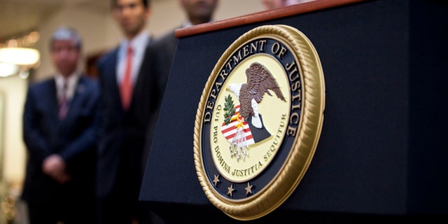 NEW YORK, NY - DECEMBER 11: A US Department of Justice seal is displayed on a podium during a news conference to announce money laundering charges against HSBC on December 11, 2012 in the Brooklyn borough of New York City. HSBC Holdings plc and HSBC USA NA have agreed to pay $1.92 billion and enter into a deferred prosecution agreement with the U.S. Department of Justice in regards to charges involving money laundering with Mexican drug cartels. (Photo by Ramin Talaie/Getty Images)