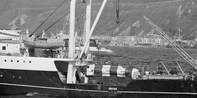 Sept. 27, 1983: A Soviet mini-submarine used to search for debris from Korean Air Lines Flight 007, shot down Sept. 1, 1983 near Sakhalin Island, rests on the deck of a conventional tender vessel in Nevel'sk, Sakhalin Island, in the East Sea off Russia.