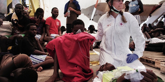 Once on board, migrants are fed, given clothing and provided with medical treatment.