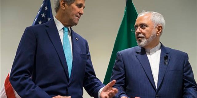 Secretary of State John Kerry, left, meets with Iranian Foreign Minister Mohammad Javad Zarif at United Nations headquarters on Sept. 26, 2015. (AP Photo/Craig Ruttle, File)