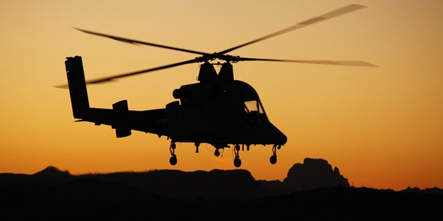 An unmanned K-MAX helicopter that is being used to deliver cargo and resupply troops in combat zones.
