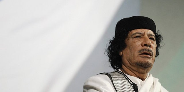 FILE: Libyan leader Muammar al-Qaddafi gives a speech in Rome August 30, 2010.