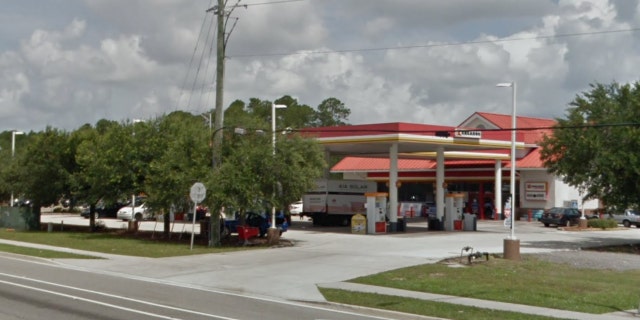 An employee at a Kangaroo Express store in Jacksonville, Florida, called police on Sunday when she saw a woman mouth the word "help" to him as she was confined to a vehicle.