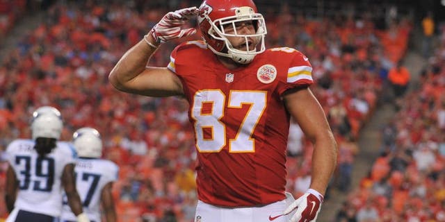 Aug 28, 2015; Kansas City, MO, USA; Kansas City Chiefs tight end Travis Kelce (87) celebrates after a run during the first half against the Tennessee Titans at Arrowhead Stadium. The Chiefs won 34-10. Mandatory Credit: Denny Medley-USA TODAY Sports