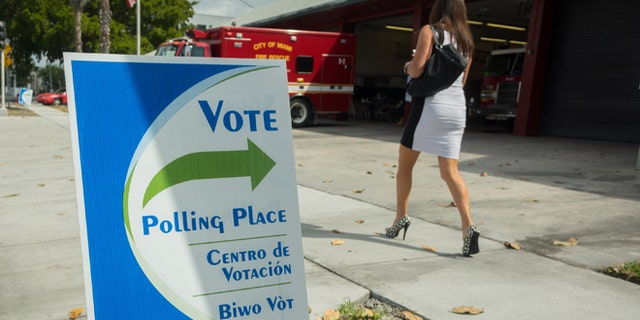 MIAMI, FL - MARCH 15: A woman arrives to vote at a fire station on March 15, 2016 in Miami, Florida. Voters cast ballots in the presidential primary in Illinois, Missouri, North Carolina, Ohio and Florida today. (Photo by Angel Valentin/Getty Images)