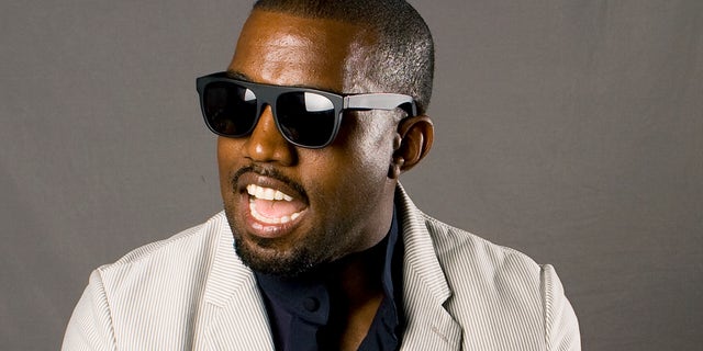 Entertainer Kanye West poses for a portrait while promoting his new collaborative book named "Thank You and You're Welcome" in New York May 22, 2009. REUTERS/Lucas Jackson (UNITED STATES ENTERTAINMENT MEDIA) - RTXLIH6