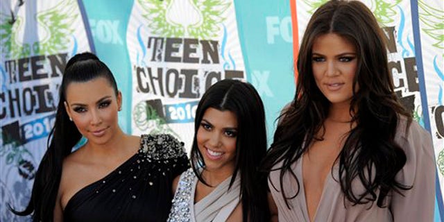 Aug. 8, 2010: From left, Kim Kardashian, Kourtney Kardashian and Khloe Kardashian arrive at the Teen Choice Awards in Universal City, Calif.