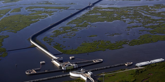 The so called "Great Wall of Louisiana", a 1.8-mile long concrete wall located east of downtown New Orleans, United States, is seen from the air Aug. 19, 2015.