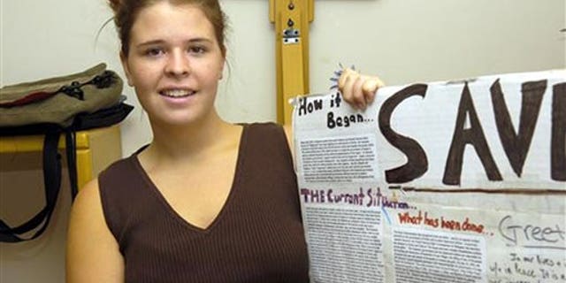 In this May 30, 2013, photo, Kayla Mueller is shown after speaking to a group in Prescott, Ariz. A statement that appeared on a militant website commonly used by the Islamic State group claimed that Mueller was killed in a Jordanian airstrike on Friday, Feb. 6, 2015, on the outskirts of the northern Syrian city of Raqqa, the militant group's main stronghold. The IS statement could not be independently verified. (AP Photo/The Daily Courier, Matt Hinshaw) MANDATORY CREDIT