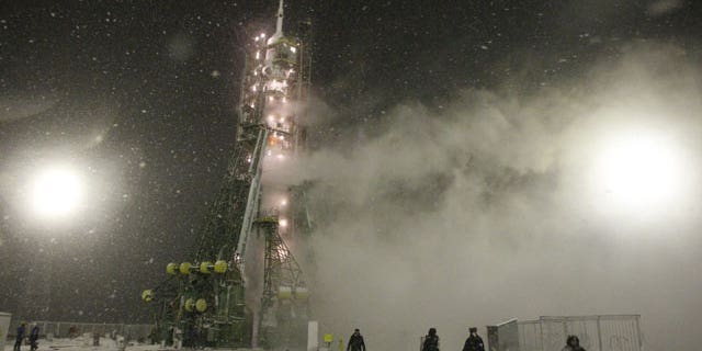 November 14, 2011: The Russian Soyuz TMA-22 space ship attached on the Soyuz-FG rocket booster is seen prior to the launch at the Russian leased Baikonur Cosmodrome in Kazakhstan.