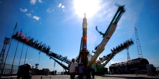 June 5, 2011: Service towers lift to the Russian Soyuz TMA-02M space ship that will carry new crew to the International Space Station, ISS, at the launch pad at the Russian leased Baikonur cosmodrome, Kazakhstan. The start of the new Soyuz mission to the International Space Station is scheduled on Wednesday, June 8.