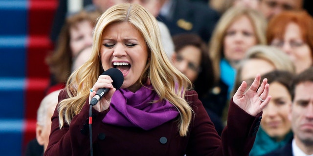 Kelly Clarkson sings "My Country 'Tis of Thee" during swearing-in ceremonies for U.S. President Barack Obama on the West front of the U.S Capitol in Washington, January 21, 2013.