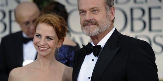 Kelsey Grammer and his wife Kayte Walsh arrive at the 69th Annual Golden Globe Awards Sunday, Jan. 15, 2012, in Los Angeles. (AP Photo/Chris Pizzello)