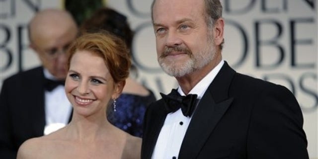 Kelsey Grammer and his wife Kayte Walsh arrive at the 69th Annual Golden Globe Awards Sunday, Jan. 15, 2012, in Los Angeles. (AP Photo/Chris Pizzello)
