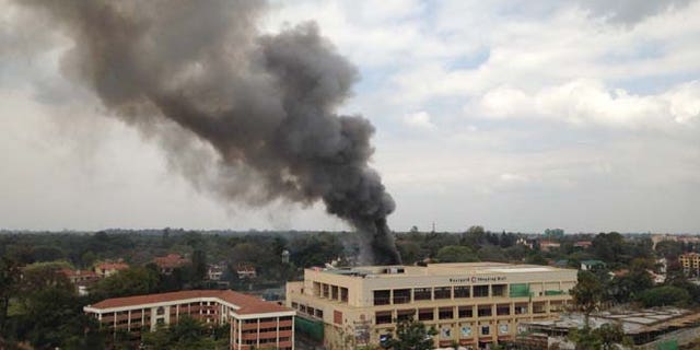 Sept. 23, 2013: In this file photo, heavy smoke rises after multiple large blasts rocked the Westgate Mall in Nairobi, Kenya. (AP)