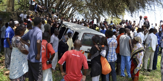 Aug. 27, 2012: Members of the public gather at the scene where Aboud Rogo was shot and killed in a beach area of Mombasa, Kenya, according to local sources.