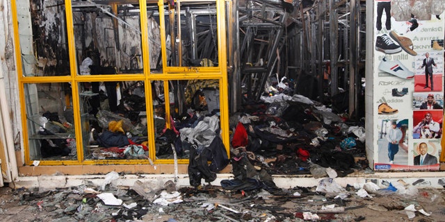 May 29: Destroyed shop after an explosion in downtown Nairobi. The explosion ripped through a building, injuring at least 33 people, including a woman who blamed the blast on a 'bearded man' who left behind a bag shortly before the detonation.