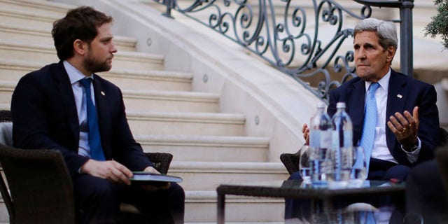 July 10, 2015: Secretary of State John Kerry, right, and State Department Chief of Staff Jon Finer at the Iran nuclear talks, Vienna, Austria.